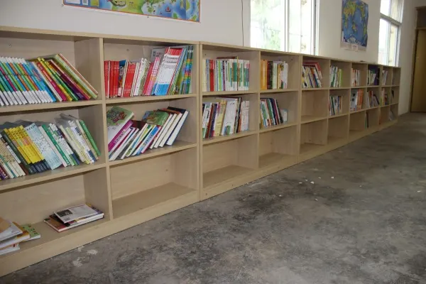 Shelves running the length of the reading room.
