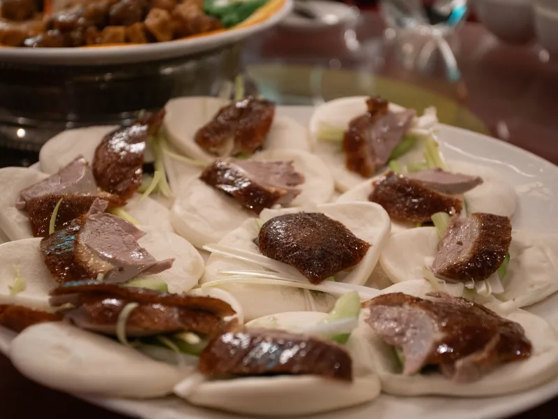 A platter of Peking duck served with steamed buns and scallions at the Lunar New Year Celebration.