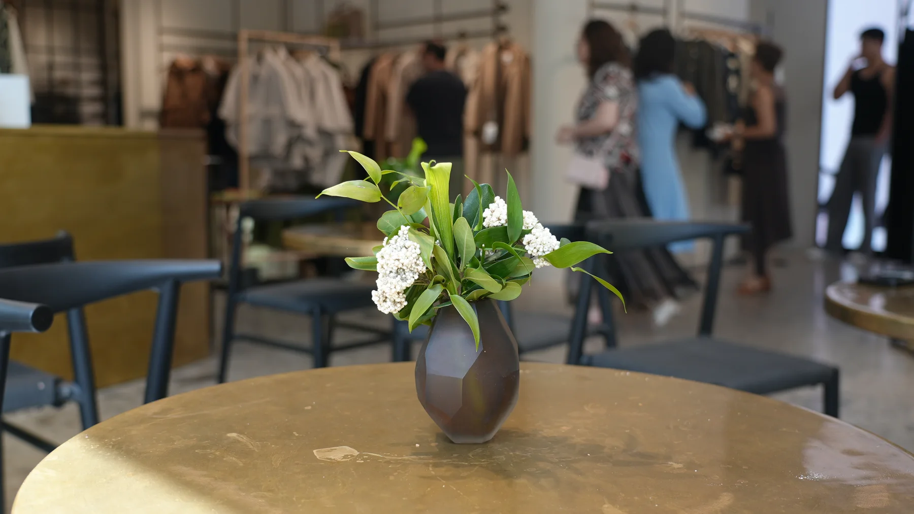 Guests browsing the collection at Max Mara Manhasset during the CAAF fundraising event.